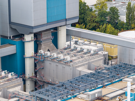 Aerial view of the Heizkraftwerk Reuter West combined heat and power plant featuring industrial metal structures cooling systems and complex piping in Berlin Berlin Germany.