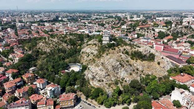 Aerial view of Plovdiv cityscape and hills in Bulgaria.
