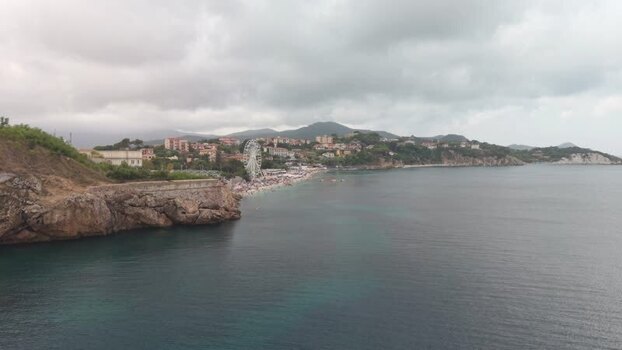 Aerial view of Portoferraio beach and ferris wheel Italy.