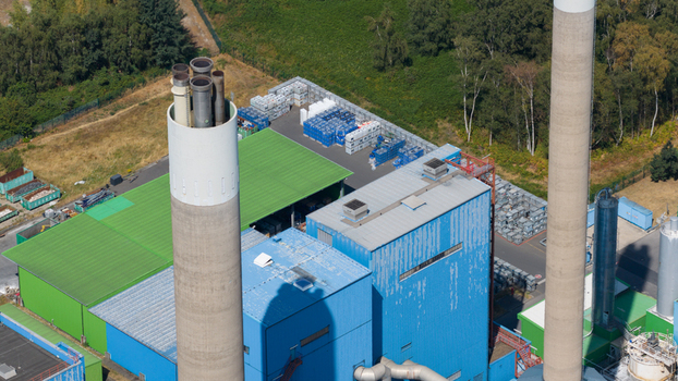 Aerial view of the Abfallkraftwerk Herten waste to energy plant with complex industrial piping chimneys and metal structures Herten Nordrhein Westfalen Germany.