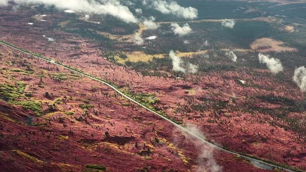 Aerial view of Denali Highway in the Alaskan tundra United States.