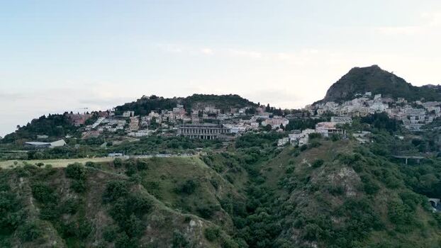 Aerial view of the Ancient Theatre and hillside in Taormina Italy.
