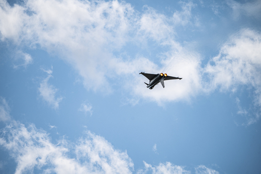Berlin Germany 13 June 2026 View of Eurofighter Typhoon performing an aerial display at the ILA Berlin Air Show against a bright blue sky with scattered clouds. Berlin Germany 13 June 2026 View of Eurofighter Typhoon performing an aerial display at the ILA Berlin Air Show against a bright blue sky with scattered clouds.