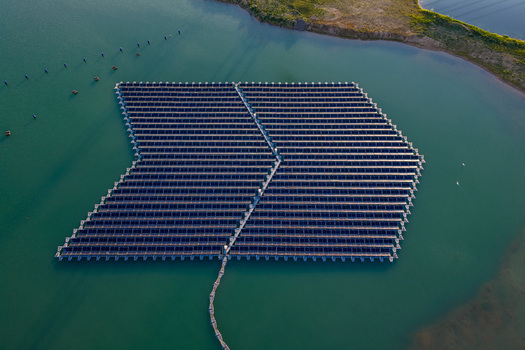 Aerial view of floating solar panel array on a calm lake Bensheim Hessen Germany. Aerial view of floating solar panel array on a calm lake Bensheim Hessen Germany.