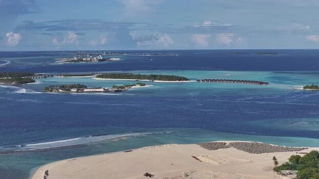 Aerial view of Gulhi island and turquoise lagoons Maldives. Aerial view of Gulhi island and turquoise lagoons Maldives.