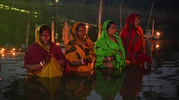View of women performing a religious ritual in water Bangladesh. View of women performing a religious ritual in water Bangladesh.