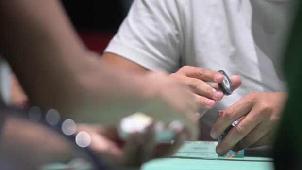View of hands playing poker with chips Portugal. View of hands playing poker with chips Portugal.