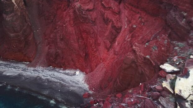 Aerial view of Red beach and volcanic cliffs Greece.