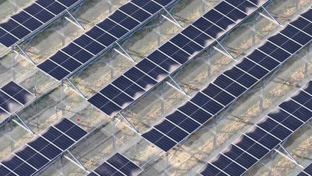 Aerial view of solar panels in a solar farm in Faenza Italy.