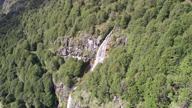 Aerial view of waterfall in forest Chile. Aerial view of waterfall in forest Chile.