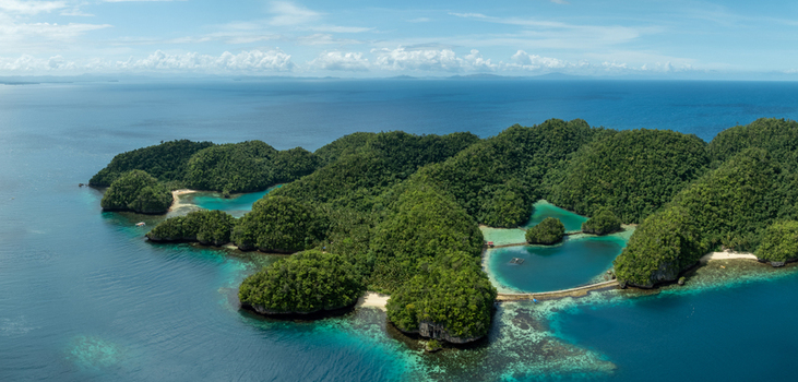 Aerial view of Bucas Grande islands with lush green vegetation turquoise lagoons and clear blue water in Siargao Philippines. Aerial view of Bucas Grande islands with lush green vegetation turquoise lagoons and clear blue water in Siargao Philippines.