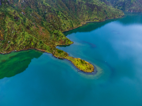 Ribeira Grande Portugal 12 May 2025 Aerial view of Lagoa do Fogo surrounded by lush green volcanic hills and turquoise waters. Ribeira Grande Portugal 12 May 2025 Aerial view of Lagoa do Fogo surrounded by lush green volcanic hills and turquoise waters.