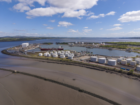 Grangemouth United Kingdom 06 May 2026 Aerial view of Grangemouth refinery and port facilities with large oil storage tanks shipping containers and industrial infrastructure. Grangemouth United Kingdom 06 May 2026 Aerial view of Grangemouth refinery and port facilities with large oil storage tanks shipping containers and industrial infrastructure.