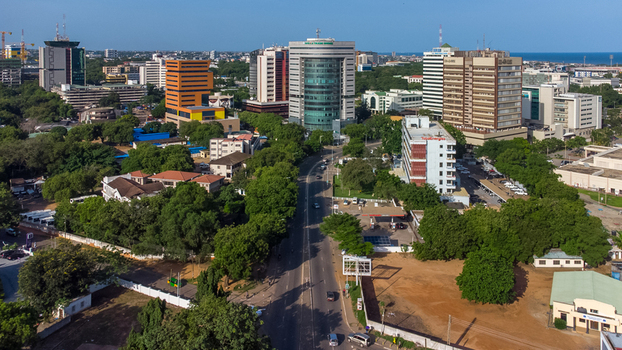 Accra Ghana 26 May 2023 Aerial view of the modern skyline and office buildings in the city center of Accra surrounded by lush green trees and urban infrastructure. Accra Ghana 26 May 2023 Aerial view of the modern skyline and office buildings in the city center of Accra surrounded by lush green trees and urban infrastructure.