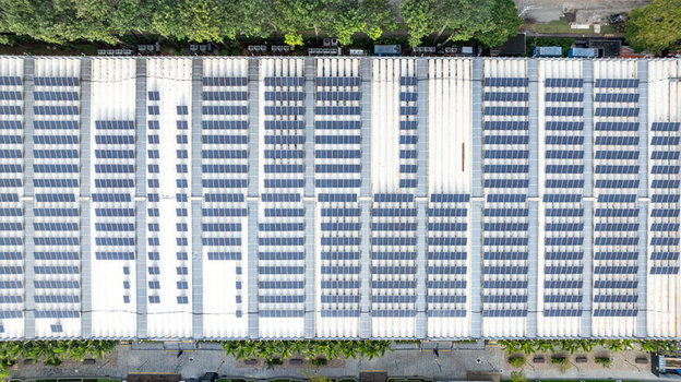 Aerial view of the solar panel array on the roof of the Mercado Livre headquarters featuring rows of photovoltaic cells for renewable energy generation in Osasco State of Sao Paulo Brazil.