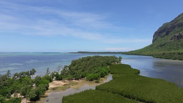 Aerial view of Le Morne Brabant mountain and lagoon Mauritius.