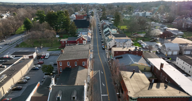 Aerial view of downtown Elizabethtown featuring historic buildings commercial storefronts and a main street lined with parked cars in Elizabethtown Pennsylvania United States. Aerial view of downtown Elizabethtown featuring historic buildings commercial storefronts and a main street lined with parked cars in Elizabethtown Pennsylvania United States.