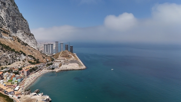 Gibraltar Gibraltar 02 July 2024 Aerial view of the Construction Development and Catalan Bay featuring modern high rise towers near the Rock of Gibraltar and the Mediterranean Sea. Gibraltar Gibraltar 02 July 2024 Aerial view of the Construction Development and Catalan Bay featuring modern high rise towers near the Rock of Gibraltar and the Mediterranean Sea.
