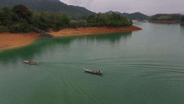 Aerial view of Batang Ai reservoir with boats in Lubok Antu Malaysia. Aerial view of Batang Ai reservoir with boats in Lubok Antu Malaysia.
