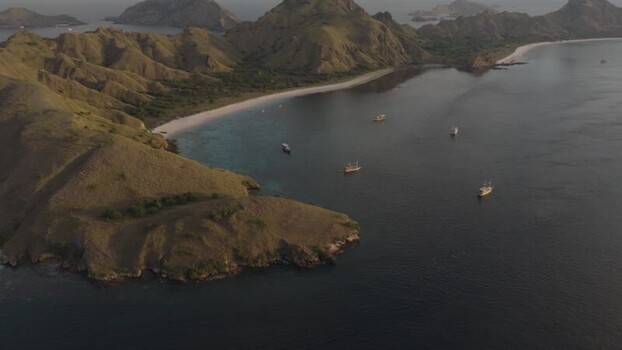Aerial view of Komodo Island and boats in Indonesia.