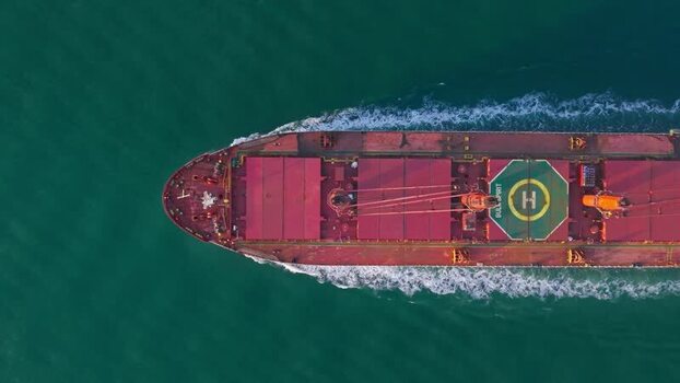 Aerial view of a large cargo ship navigating the sea Netherlands.