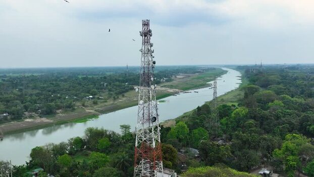 Aerial view of telecommunication towers near a river Bangladesh. Aerial view of telecommunication towers near a river Bangladesh.