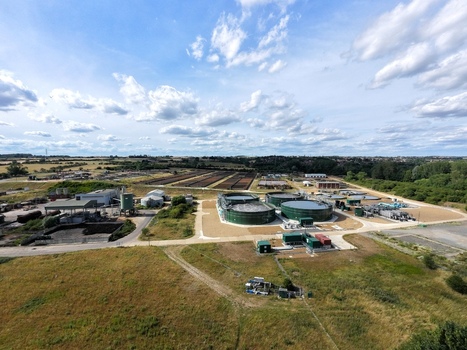 Aerial view of Broadholme water recycling centre with its large circular tanks and industrial infrastructure surrounded by fields in Rushden England United Kingdom. Aerial view of Broadholme water recycling centre with its large circular tanks and industrial infrastructure surrounded by fields in Rushden England United Kingdom.
