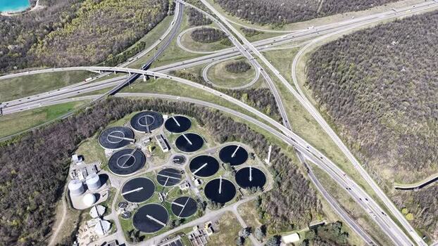 Aerial view of highways and water treatment plant France.