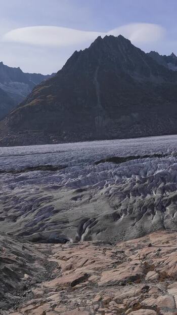 Aerial view of Aletsch Glacier and mountain peaks Switzerland.