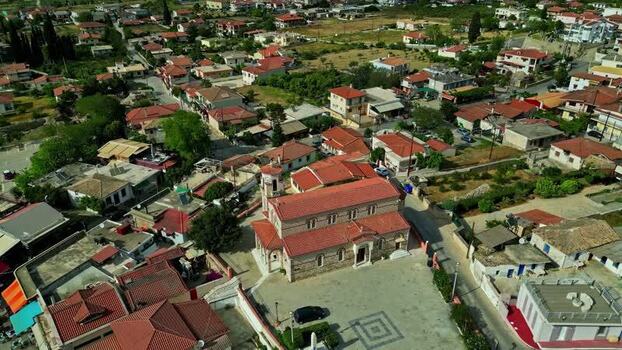 Aerial view of a Greek village with a central church Greece.