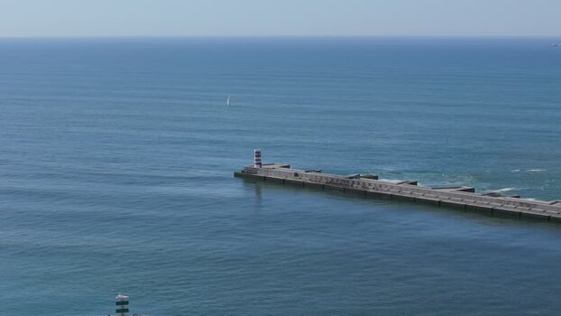 Aerial view of Farolim da Barra do Douro on the breakwater Portugal. Aerial view of Farolim da Barra do Douro on the breakwater Portugal.