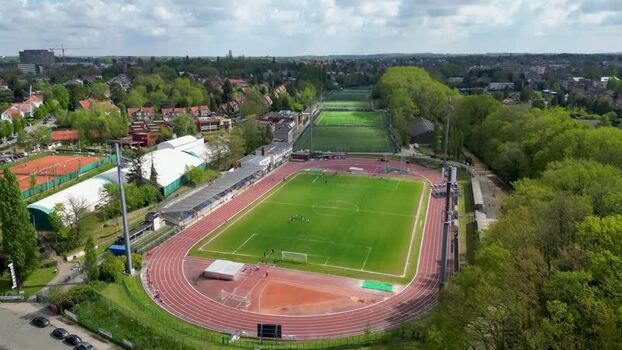 Aerial view of a sports complex with a running track and pitch Belgium.