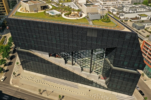 Aerial view of the Axel Springer Neubau featuring its modern glass facade and lush rooftop garden in Berlin Berlin Germany. Aerial view of the Axel Springer Neubau featuring its modern glass facade and lush rooftop garden in Berlin Berlin Germany.