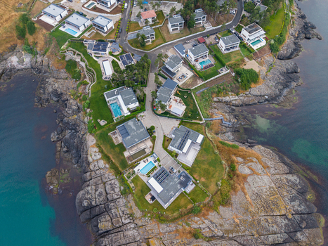 Aerial view of modern villas with swimming pools situated on the rocky coastline of Arapya in Burgas Bulgaria. Aerial view of modern villas with swimming pools situated on the rocky coastline of Arapya in Burgas Bulgaria.