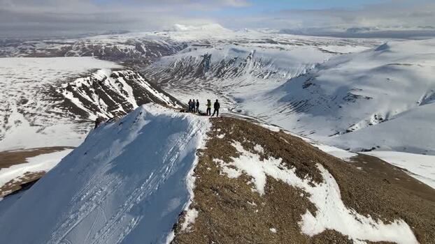 Aerial view of people on Moskardshnjukar Trail peak Iceland. Aerial view of people on Moskardshnjukar Trail peak Iceland.