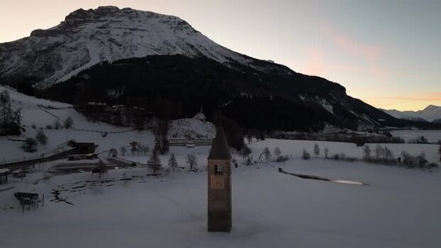 Aerial view of the submerged bell tower in Graun im Vinschgau Italy. Aerial view of the submerged bell tower in Graun im Vinschgau Italy.