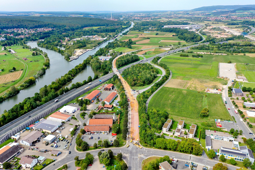 Forchheim Germany 02 May 2026 Aerial view of the A73 motorway construction site with a bridge overpass the Regnitz river and surrounding green fields. Forchheim Germany 02 May 2026 Aerial view of the A73 motorway construction site with a bridge overpass the Regnitz river and surrounding green fields.