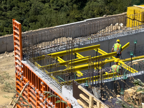 View of construction workers installing formwork and rebar for a concrete structure at a building site in Istanbul Istanbul Turkiye. View of construction workers installing formwork and rebar for a concrete structure at a building site in Istanbul Istanbul Turkiye.