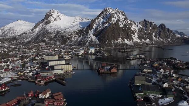 Aerial view of Lofoten coastal town with mountains Norway.