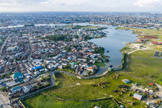 Port Harcourt Rivers Nigeria 03 July 2026 Aerial view of Port Harcourt showing dense urban housing waterways and industrial areas under a clear sky. Port Harcourt Rivers Nigeria 03 July 2026 Aerial view of Port Harcourt showing dense urban housing waterways and industrial areas under a clear sky.