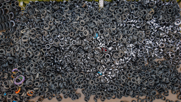 Aerial view of a massive pile of used car tires at a recycling facility in Valmiera Valmiera Latvija.