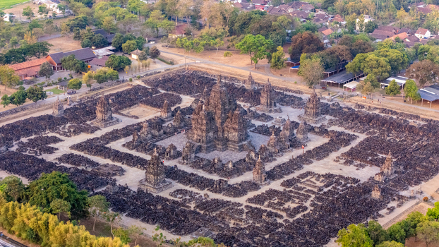 Aerial view of Sewu Temple an ancient Buddhist temple complex with a central shrine surrounded by rows of smaller stupas set in Kecamatan Prambanan Jawa Tengah Indonesia.