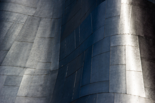 View of the metallic curved paneled exterior of the Museum of Pop Culture in Seattle Washington United States.