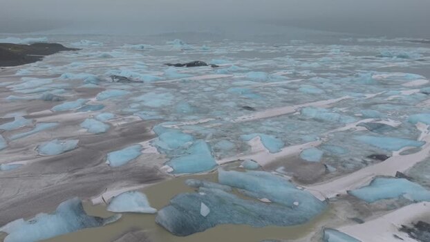 Aerial view of Fjallsarlon glacier lagoon and icebergs Iceland. Aerial view of Fjallsarlon glacier lagoon and icebergs Iceland.