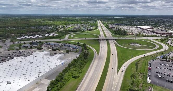 Aerial view of a highway interchange and retail area United States. Aerial view of a highway interchange and retail area United States.