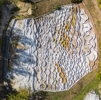 Aerial view of Egerszalok salt hill and travertine terraces on sunny day Aerial view of Egerszalok salt hill and travertine terraces on sunny day