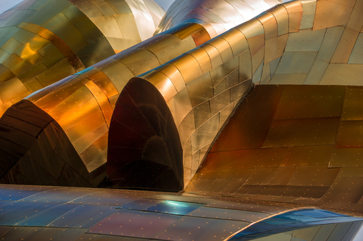 View of the metallic curved exterior panels of the Museum of Pop Culture in Seattle Washington United States.