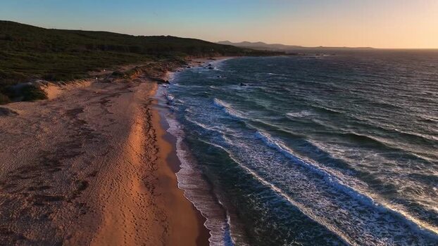 Aerial view of the sandy beach and coastline of Costa Paradiso Italy. Aerial view of the sandy beach and coastline of Costa Paradiso Italy.