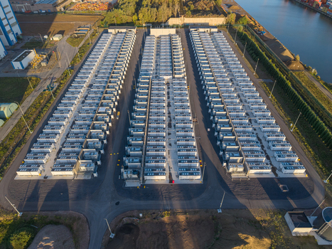 Aerial view of the Cargovil battery energy storage system featuring rows of industrial battery containers and power infrastructure in Vilvoorde Vlaanderen Belgium. Aerial view of the Cargovil battery energy storage system featuring rows of industrial battery containers and power infrastructure in Vilvoorde Vlaanderen Belgium.