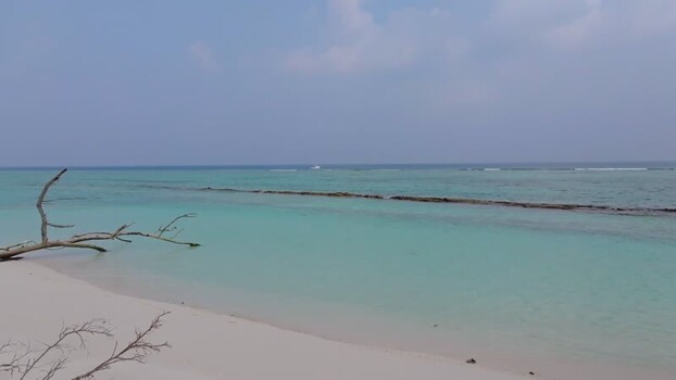 Aerial view of boat in ocean water Maldives.